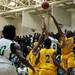 Ypsilanti and Huron players reach for a rebound in the game on Friday, March 8. Daniel Brenner I AnnArbor.com